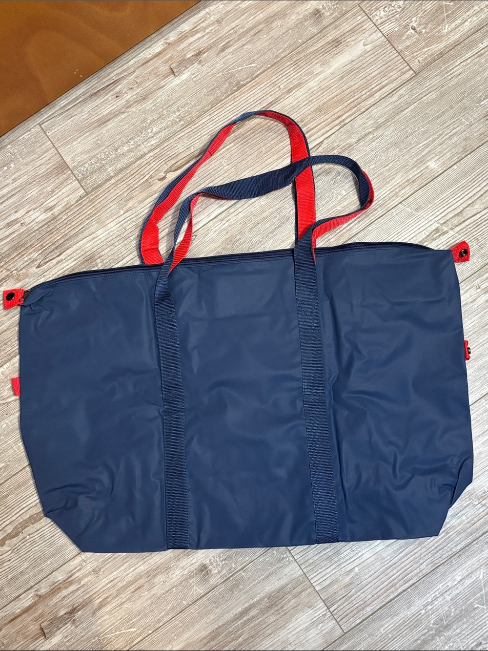 American Tourister Navy Duffel Tote with Red Trim - Picture 2 of 8